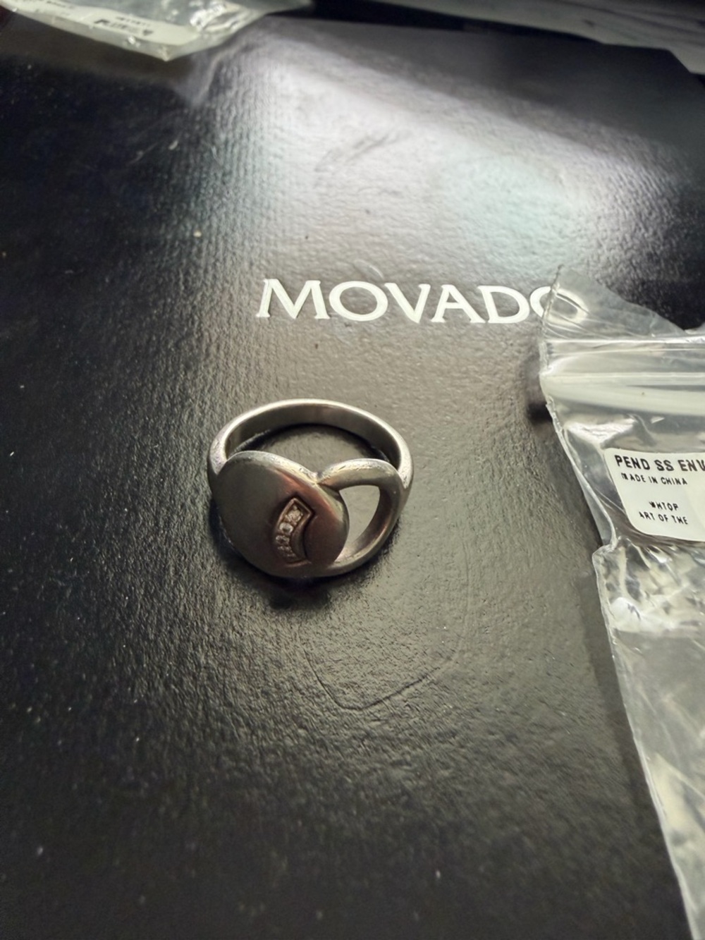 Movado Woman”s Silver Ring with Curved Inset Accent